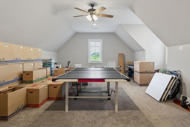 playroom with ceiling fan, vaulted ceiling, and carpet floors