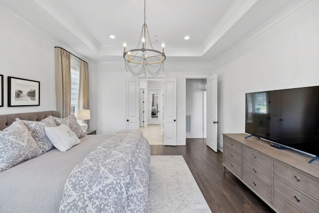 2041 Kingsbarns Dr, Nolensville, TN 37135 - bedroom featuring an inviting chandelier, a raised ceiling, ornamental molding, dark wood-type flooring, and recessed lighting