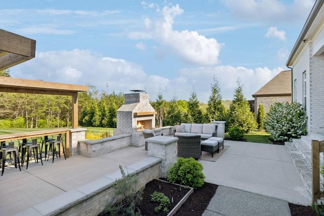 2041 Kingsbarns Dr, Nolensville, TN 37135 - view of patio / terrace featuring an outdoor living space with a fireplace