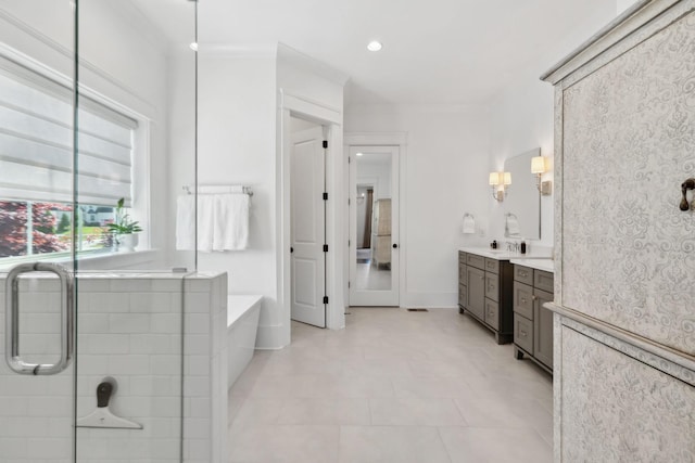 2041 Kingsbarns Dr, Nolensville, TN 37135 - bathroom with a garden tub, vanity, and recessed lighting