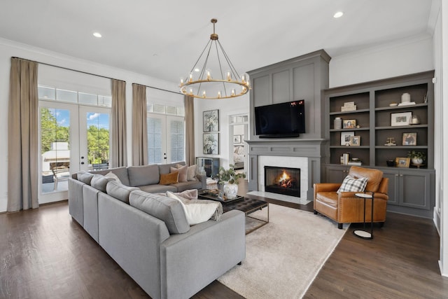 2041 Kingsbarns Dr, Nolensville, TN 37135 - living room with a fireplace with flush hearth, dark wood finished floors, ornamental molding, and recessed lighting