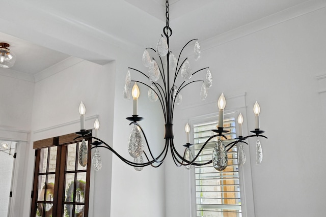 2041 Kingsbarns Dr, Nolensville, TN 37135 - interior details featuring french doors and an inviting chandelier