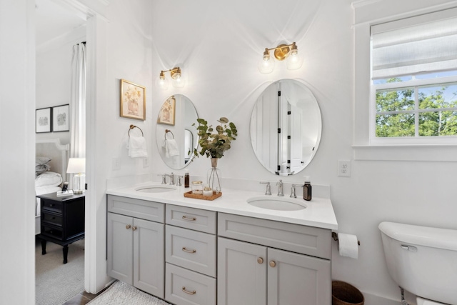 2041 Kingsbarns Dr, Nolensville, TN 37135 - bathroom featuring double vanity, toilet, and a sink