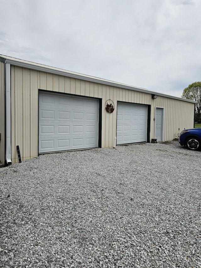garage featuring driveway