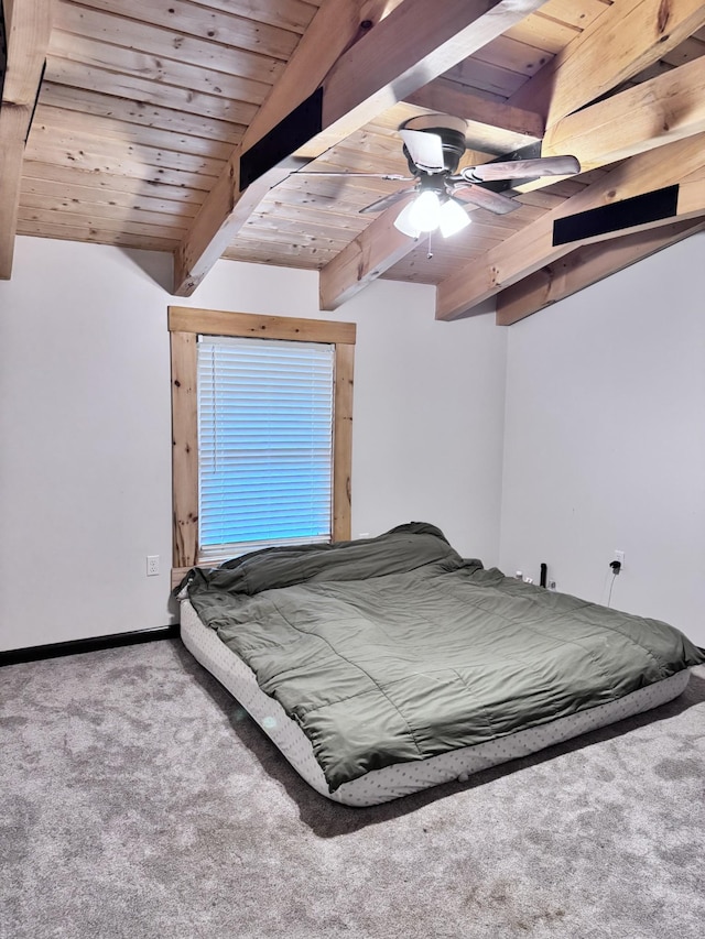 bedroom with wood ceiling, carpet flooring, and beam ceiling