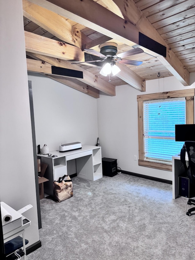 office area with baseboards, beamed ceiling, a ceiling fan, wood ceiling, and carpet floors