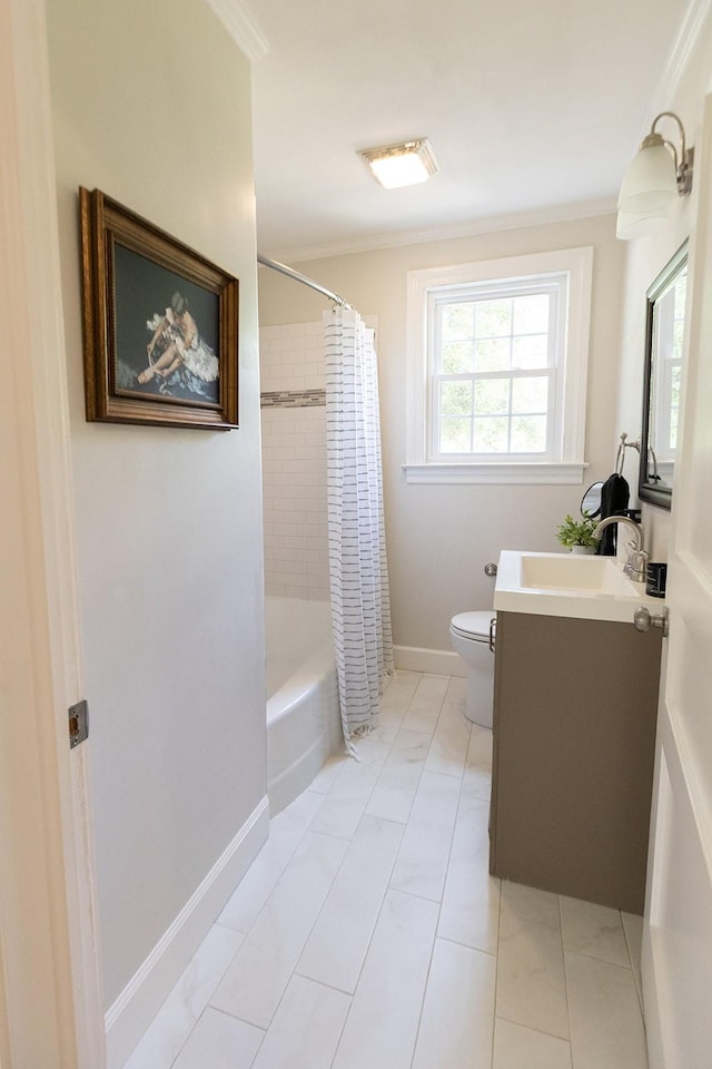 full bath with crown molding, shower / bath combo, vanity, toilet, and baseboards