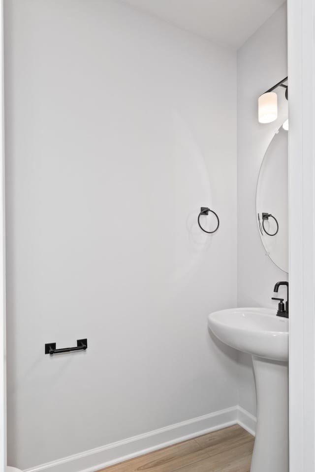 264 Subban Ct, Lebanon, TN 37087 - bathroom with baseboards and wood finished floors