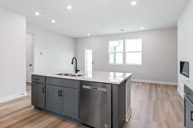 264 Subban Ct, Lebanon, TN 37087 - kitchen with a sink, light wood-style floors, gray cabinetry, dishwasher, and light countertops