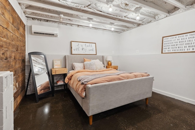 bedroom featuring baseboards and an AC wall unit