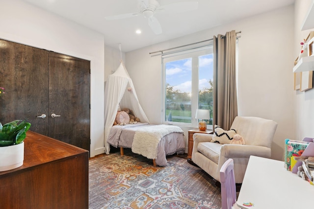 bedroom with recessed lighting, wood finished floors, and a ceiling fan