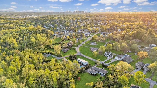 birds eye view of property with a residential view