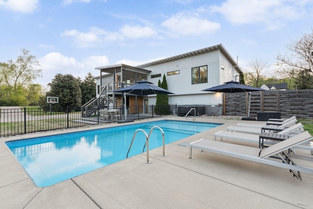 view of pool with fence, a patio, and a fenced in pool