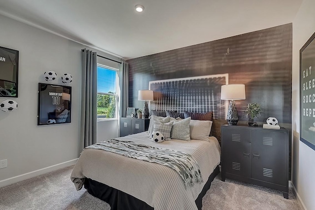 bedroom featuring baseboards and carpet floors