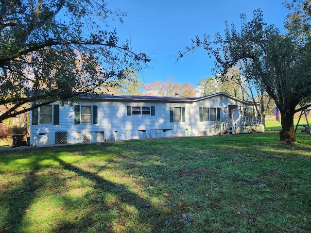 2537 Harrison Pike, Cleveland, TN 37311 - rear view of house featuring a lawn