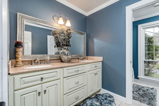 bathroom featuring ornamental molding, tile patterned flooring, a sink, and double vanity