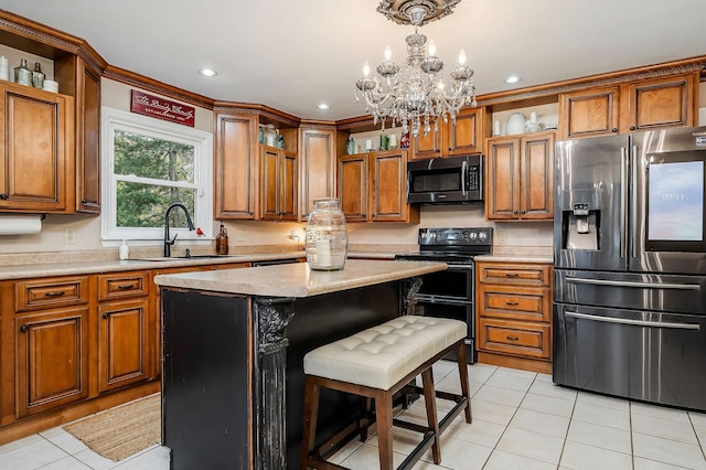 kitchen with a sink, light tile patterned flooring, brown cabinets, open shelves, and appliances with stainless steel finishes