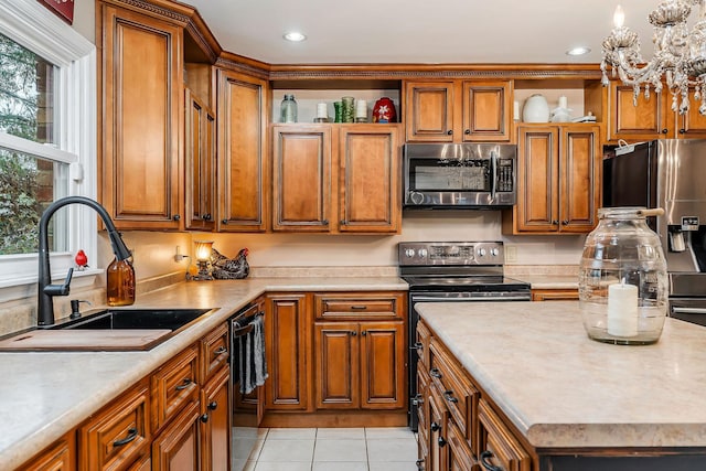 kitchen featuring open shelves, a sink, brown cabinets, and appliances with stainless steel finishes