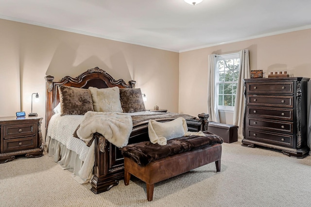 bedroom with crown molding and carpet