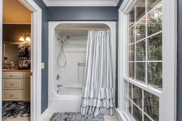 bathroom featuring shower / tub combo, ornamental molding, tile patterned flooring, and vanity