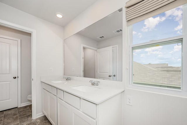 118 Olivia Cir, Chapel Hill, TN 37034 - bathroom with toilet, double vanity, baseboards, and stone finish floors