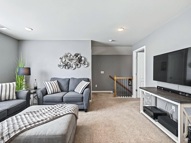 living area with baseboards, carpet flooring, visible vents, and recessed lighting
