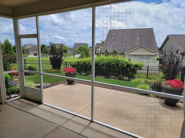 141 Tipton Pass, Spring Hill, TN 37174 - unfurnished sunroom featuring a residential view