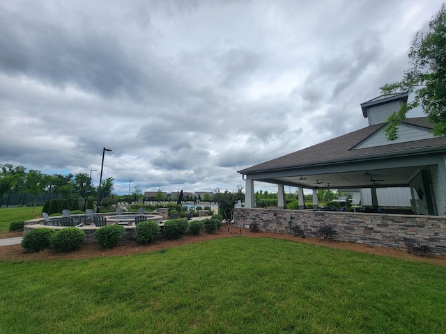 141 Tipton Pass, Spring Hill, TN 37174 - view of green lawn with a patio and a ceiling fan