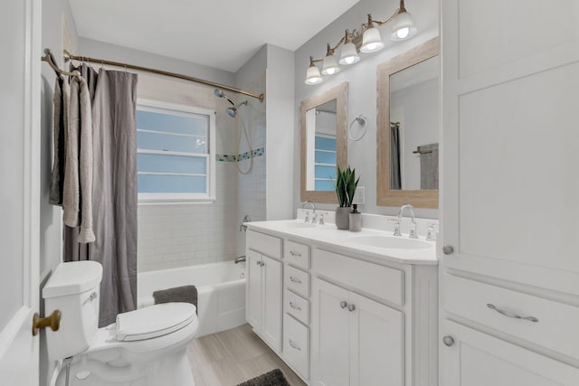 full bathroom with double vanity, toilet, shower / tub combo with curtain, and a sink