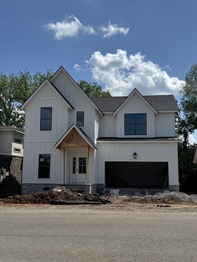 446 Roberts St, Murfreesboro, TN 37130 - modern farmhouse featuring board and batten siding, a shingled roof, and a garage
