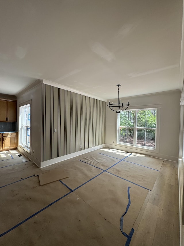 446 Roberts St, Murfreesboro, TN 37130 - interior space with crown molding, a notable chandelier, and baseboards