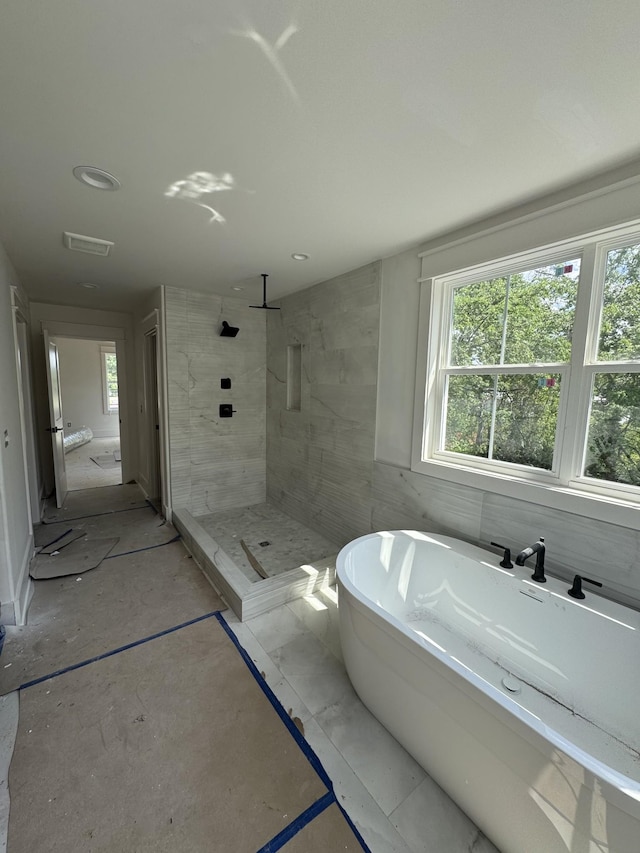 446 Roberts St, Murfreesboro, TN 37130 - full bath with a tile shower, a healthy amount of sunlight, and a freestanding bath