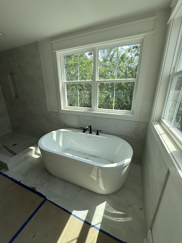 446 Roberts St, Murfreesboro, TN 37130 - full bathroom with a soaking tub, tiled shower, and marble finish floor