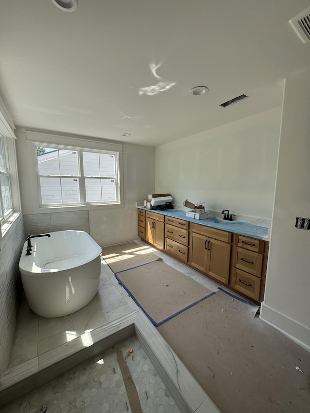 446 Roberts St, Murfreesboro, TN 37130 - full bath with visible vents, a freestanding bath, and vanity