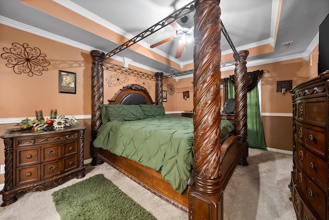 bedroom with visible vents, a ceiling fan, carpet floors, crown molding, and baseboards