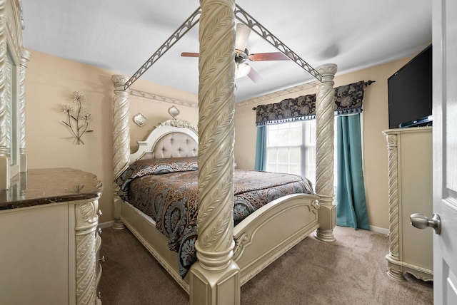 bedroom with baseboards, a ceiling fan, and carpet