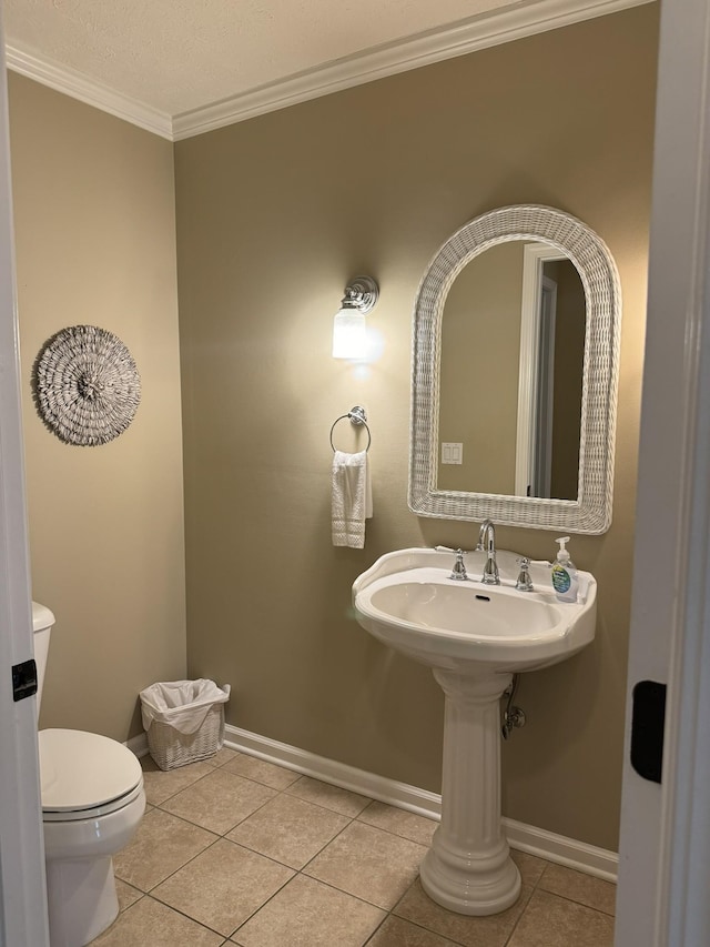 15 Cheekwood Ln, Cadiz, KY 42211 - half bath featuring tile patterned floors, baseboards, ornamental molding, and toilet