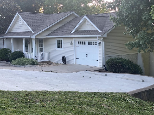 15 Cheekwood Ln, Cadiz, KY 42211 - exterior space featuring a garage, a shingled roof, concrete driveway, and covered porch