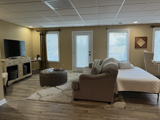 15 Cheekwood Ln, Cadiz, KY 42211 - living area with wood finished floors, visible vents, baseboards, and a healthy amount of sunlight