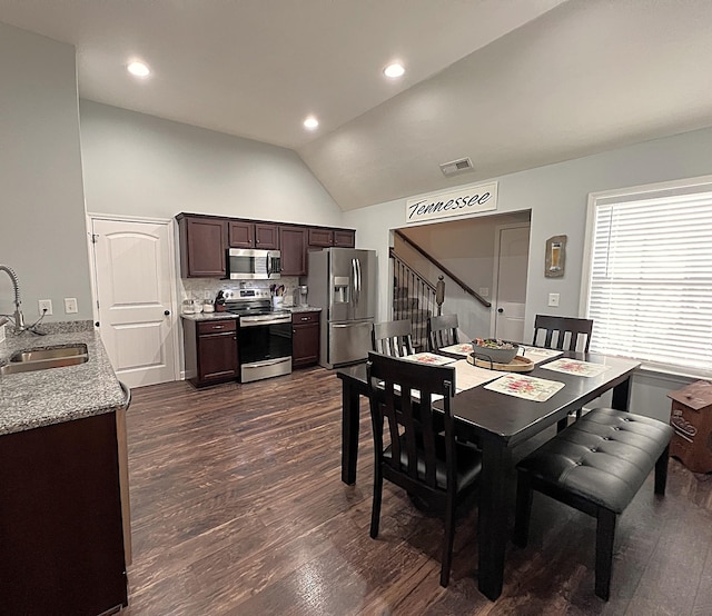 dining space with recessed lighting, dark wood finished floors, stairway, vaulted ceiling, and visible vents