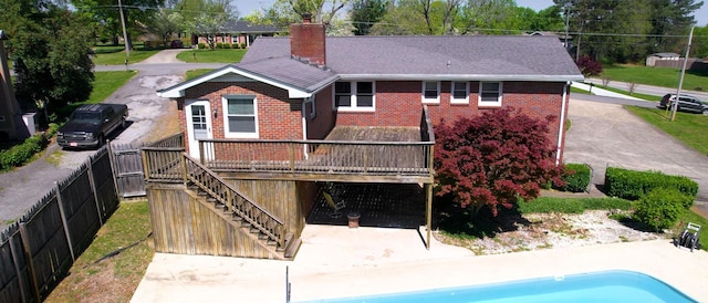 1001 Clearview Dr, Mount Juliet, TN 37122 - back of house with a chimney, brick siding, a deck, and stairway