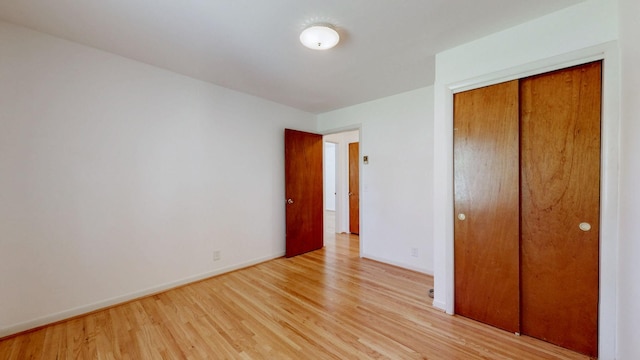 1001 Clearview Dr, Mount Juliet, TN 37122 - unfurnished bedroom featuring light wood-type flooring, baseboards, and a closet