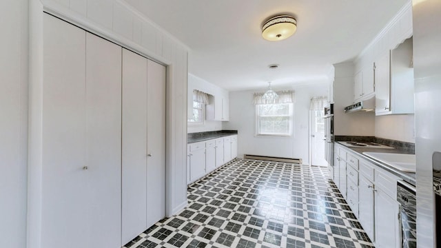 1001 Clearview Dr, Mount Juliet, TN 37122 - kitchen with white cabinets, white electric stovetop, a sink, dark countertops, and under cabinet range hood