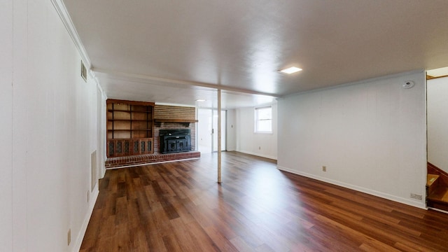 1001 Clearview Dr, Mount Juliet, TN 37122 - unfurnished living room with visible vents, baseboards, wood finished floors, a fireplace, and ornamental molding