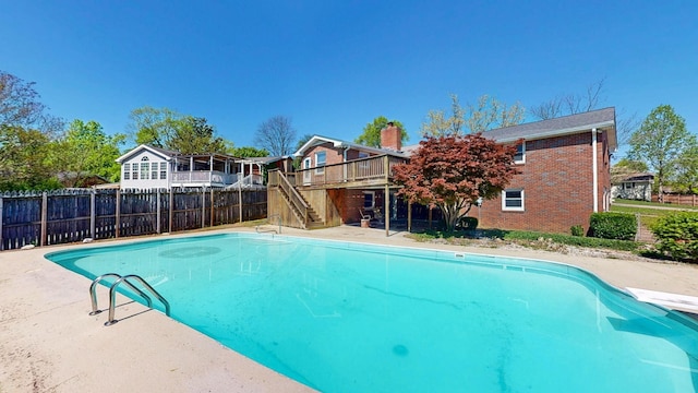 1001 Clearview Dr, Mount Juliet, TN 37122 - view of swimming pool featuring stairway, a fenced in pool, fence, and a deck