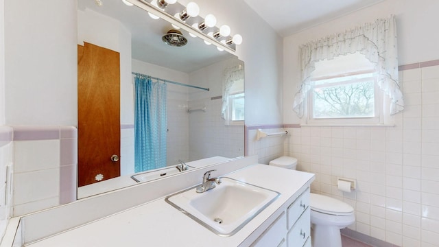 1001 Clearview Dr, Mount Juliet, TN 37122 - bathroom featuring tile walls, a healthy amount of sunlight, toilet, and a shower with curtain