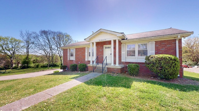 1001 Clearview Dr, Mount Juliet, TN 37122 - bungalow-style home with brick siding, a shingled roof, and a front yard