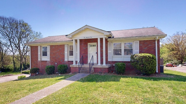 1001 Clearview Dr, Mount Juliet, TN 37122 - bungalow featuring a front lawn, brick siding, and roof with shingles