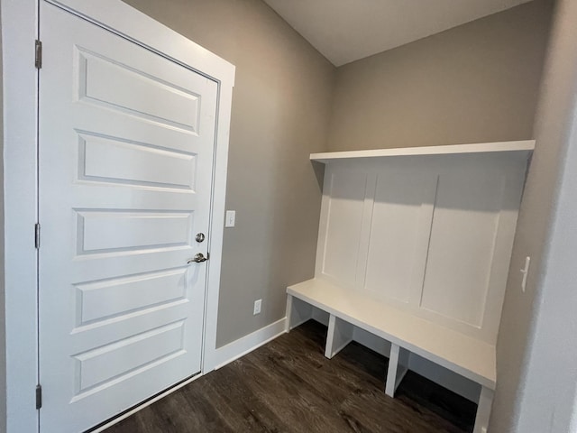 mudroom featuring baseboards and dark wood finished floors