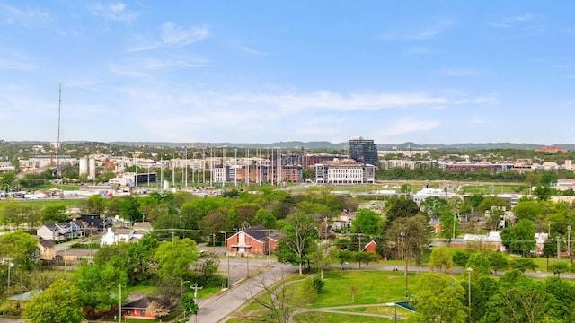 aerial view with a city view and a mountain view